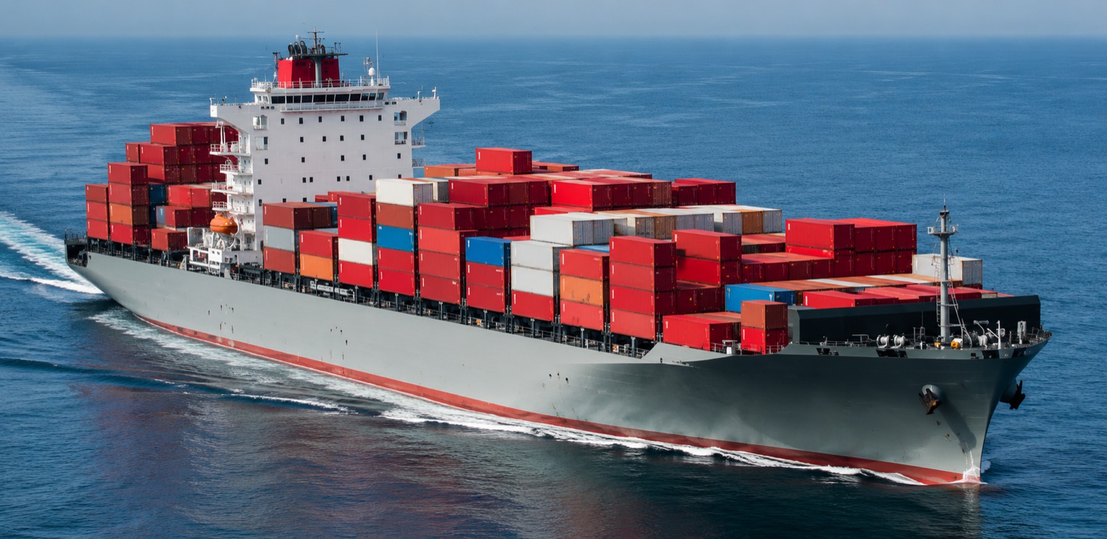 Loaded container vessel under way at sea